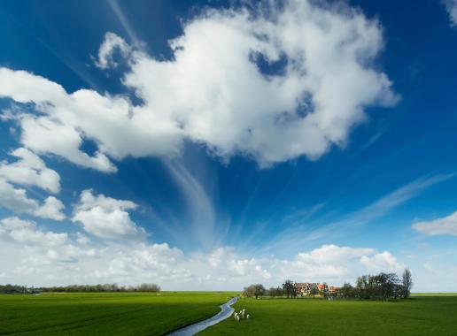 Typically Dutch landscape with clouds in the air