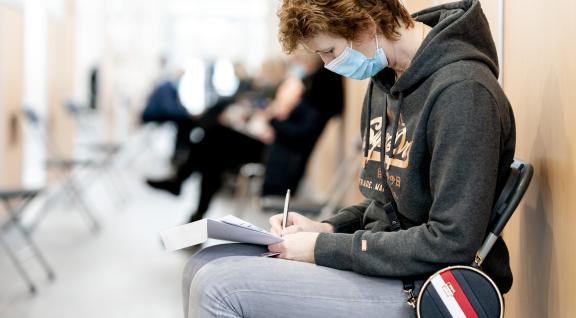 Woman waiting for COVID-19 vaccination