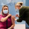 Nursing home employee receives the first COVID-19 vaccination in the Netherlands